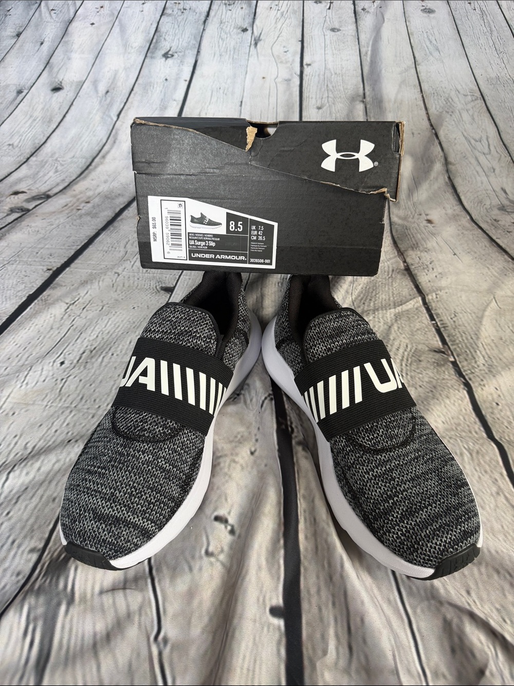 Under Armour Men’s Black and White Slip-On Knit Athletic Shoes